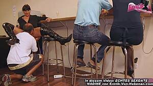 A mature German woman has sex in a bar in front of others