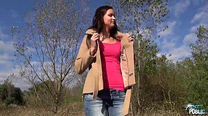 A brunette beauty has a passionate outdoor sex in nature