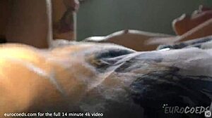 Marissa and Olga’s hot lesbian scene with a strapon on a cozy bed