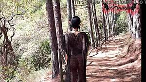 A gothic elf enjoys nature while pleasuring herself