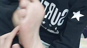 Young Asian boy enjoys foot fetish and gets his ass fucked