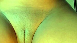 A young woman with a big and wet vagina gets fingered by a bodybuilder