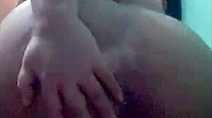 Big-assed woman with lactating breasts gives me a handjob