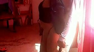 Beautiful skinny Latina MILF moans loudly during standing sex with young man