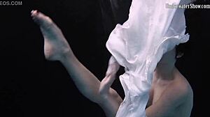 Andrejka's seductive striptease and swim in the pool